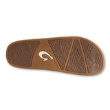 Olukai Women's "Hila" Beach Slide Sandal underside view of tread and Olukai logo