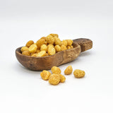 Ahualoa "Lilikoi" Hawaiian Macadamia Nuts in a serving dish.