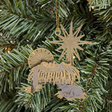 "Timeless Manger" Brass Christmas Ornament Hanging on Christmas Tree