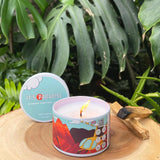 It's Paradise "Waimea Canyon" Candle with burning wick and Hawaiian flora in the background