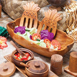 Flared Rectangular Acacia Wood Serving Bowl with filled with food and  surrounded by other serving items