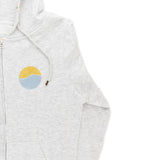 Closeup on the front graphic on the Womens "Horizon Sun" Full-Zip Hoodie