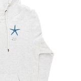 Close up of the hoodie showing the blue starfish graphic