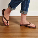 Model Wearing OluKai Women's "Aukai" Sandals- Dark Java