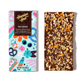 Hawaiian Host "Pau Hana" Chocolate Bar, 3-oz. in package and out showing crushed pretzels and macadamia nuts