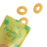 SoHa Sweets Sour Pineapple Rings Gummies with a few scattered outside the package