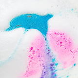 Luxiny Dolphin Rainbow Burst Bath Bomb Dissolving in Bath Water