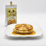 Mulvadi Original Gourmet Pancake Mix with prepared pancakes and syrup