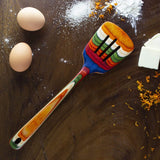 Totally Bamboo Baltique Marrakesh Slotted Spatula on table with two eggs