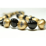 NFL New Orleans Saints Kukui Nut Lei - Polynesian Cultural Center