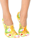 Model wearing Living Royal Pineapple Avocado No-Show Liner Socks